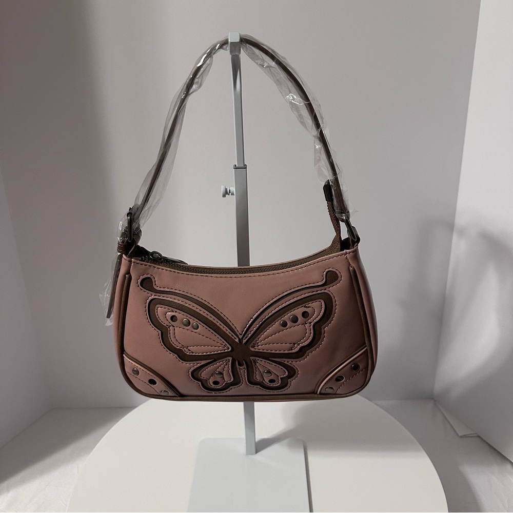 NWOT totally daring shoulder bag butterfly appliqué on the front